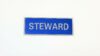 Heat-Applied STEWARD Reflective Badge Front photo